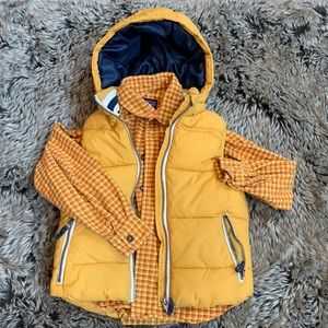 Patagonia flannel button down and H&M puffer vest